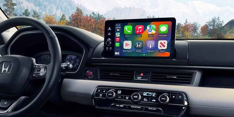 An interior photo of the 2024 Honda Pilot, showcasing it's touchscreen.