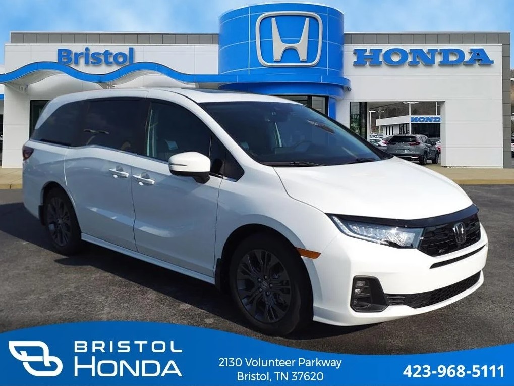 A photo of a white 2025 Honda Odyssey